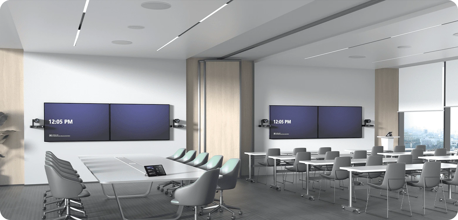 Dividable Meeting Room: Ideal for training or seminars, with ceiling-mounted equipment providing clear audio and video connectivity.